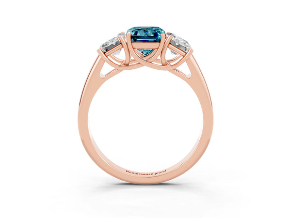 Rose gold Three-Stone Emerald Cut Blue Topaz Engagement Ring with Prong Setting