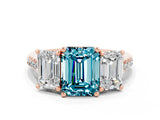 Rose gold Three-Stone Emerald Cut Blue Topaz Ring with Pavé Band and Prong Setting_12