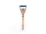 Rose gold Three-Stone Emerald Cut Blue Topaz Ring with Pavé Band and Prong Setting_14