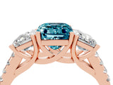 Rose gold Three-Stone Emerald Cut Blue Topaz Ring with Pavé Band and Prong Setting_16