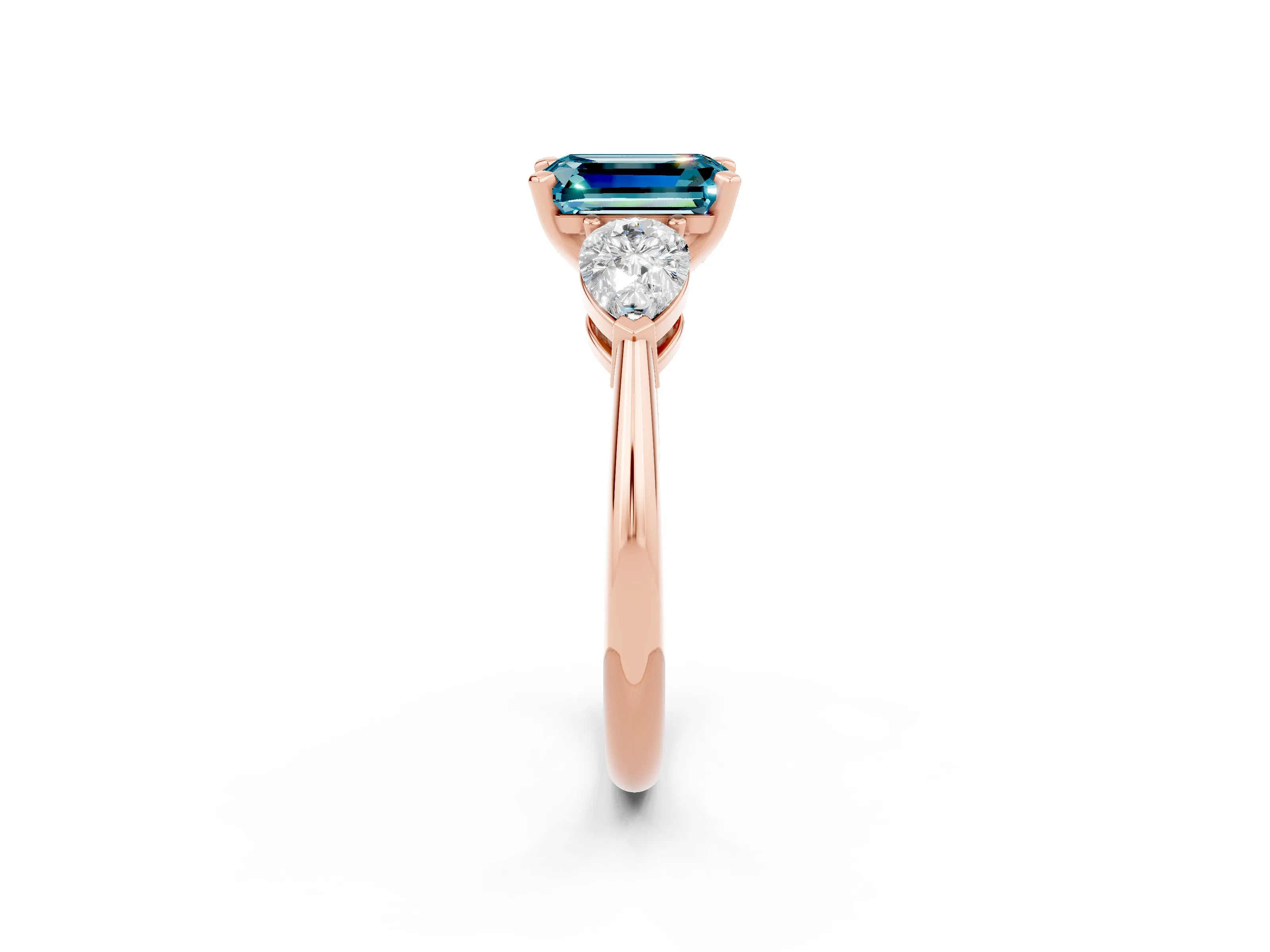 Rose gold Three-Stone Emerald Cut Blue Topaz Ring with Pear Side Stones and Four-Prong Setting_2