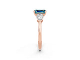 Rose gold Three-Stone Emerald Cut Blue Topaz Ring with Pear Side Stones and Four-Prong Setting_2
