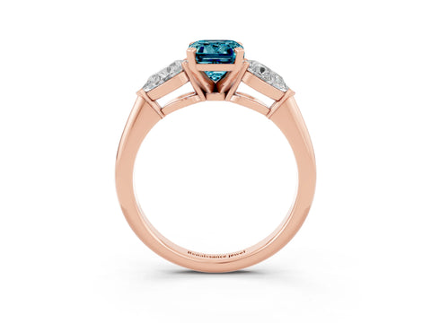 Rose gold Three-Stone Emerald Cut Blue Topaz Ring with Pear Side Stones and Four-Prong Setting_3