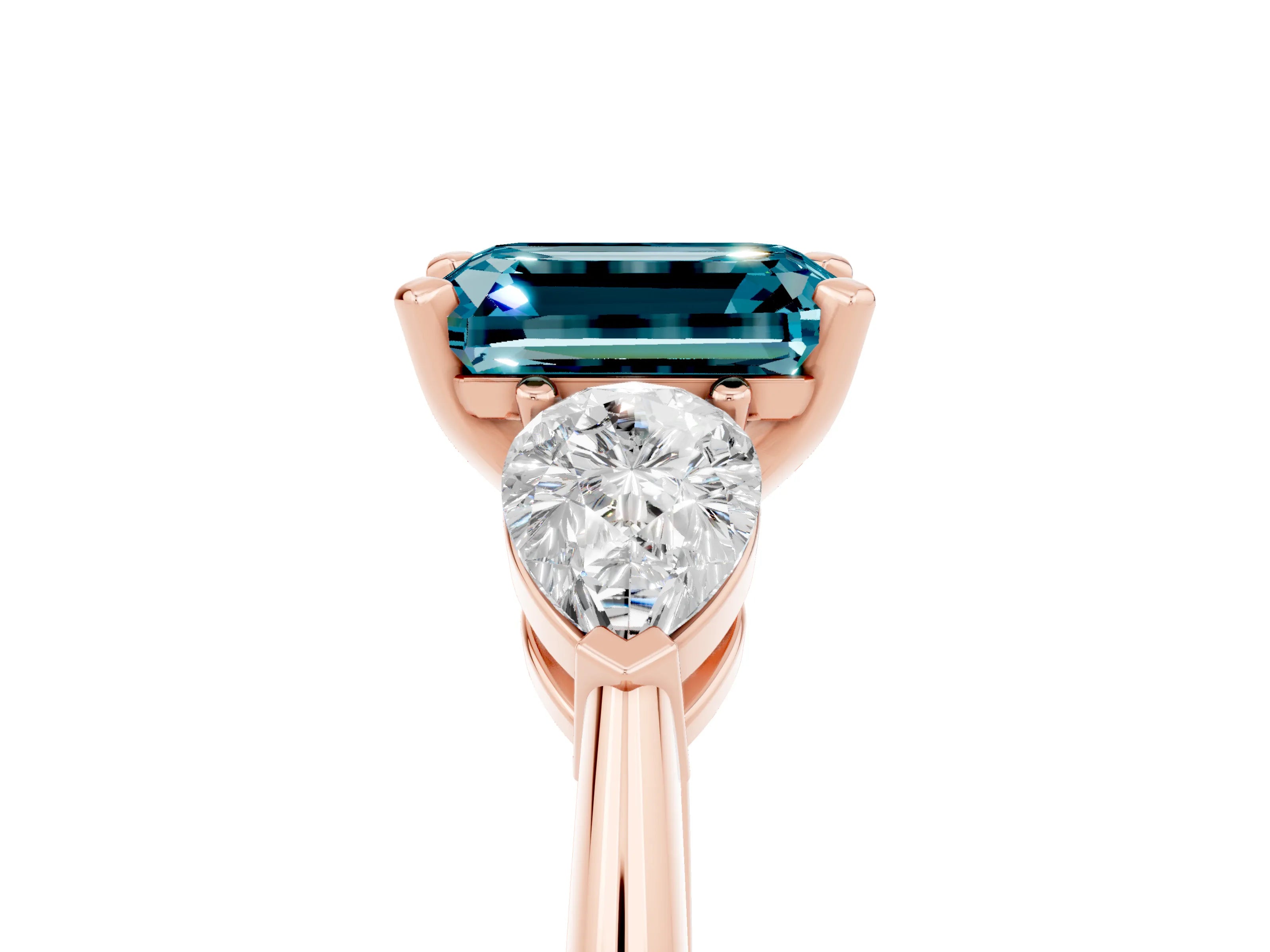Rose gold Three-Stone Emerald Cut Blue Topaz Ring with Pear Side Stones and Four-Prong Setting_5