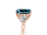 Rose gold Three-Stone Emerald Cut Blue Topaz Ring with Pear  Side Stones in Four-Prong Setting_17