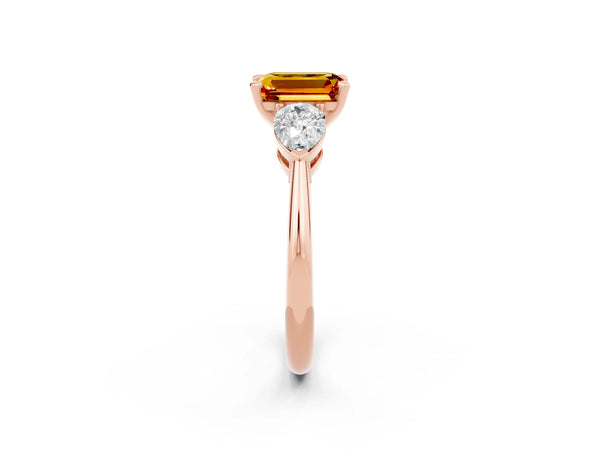 Rose gold Three-Stone Emerald Cut Citrine Ring with Pear Side Stones and Four-Prong Setting