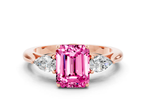 Rose gold Three-Stone Emerald Cut Cut Diamond Ring with Pear Side Stones in Four-Prong Setting