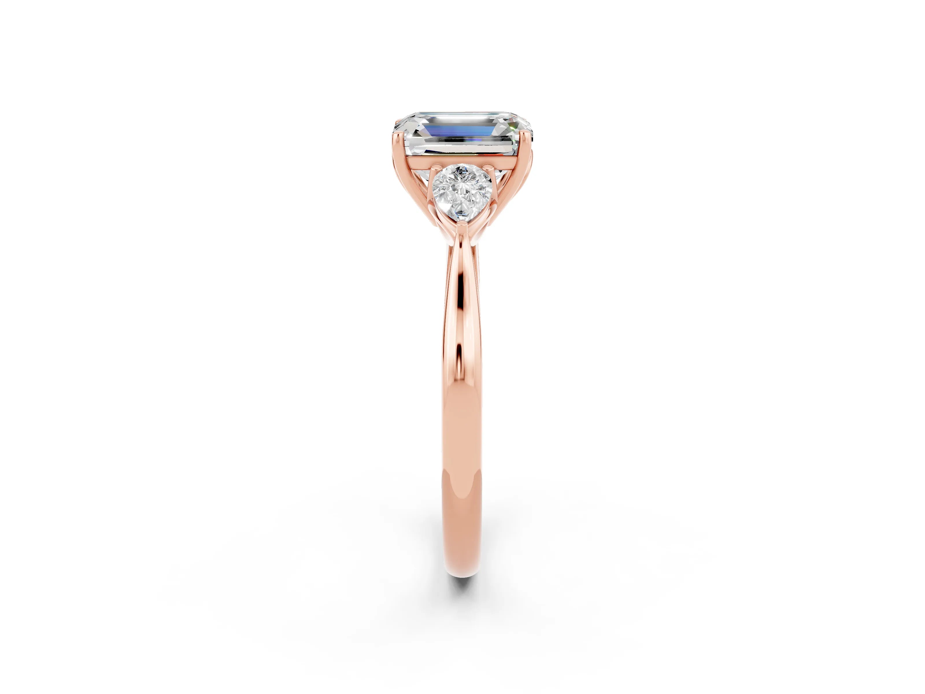 Rose gold Three-Stone Emerald Cut Cut Diamond Ring with Pear Side Stones in Four-Prong Setting_2