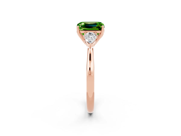 Rose gold Three-Stone Emerald Cut Cut Diamond Ring with Pear Side Stones in Four-Prong Setting