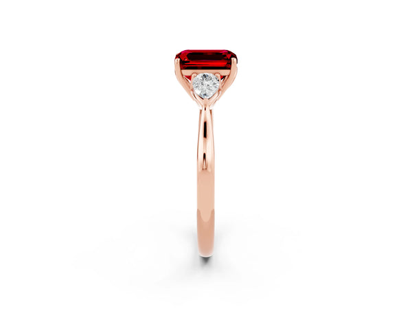 Rose gold Three-Stone Emerald Cut Cut Diamond Ring with Pear Side Stones in Four-Prong Setting