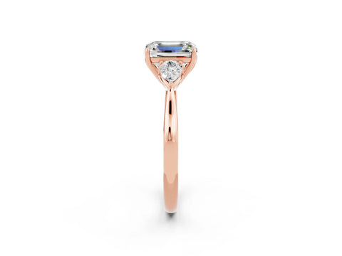 Rose gold Three-Stone Emerald Cut Cut Diamond Ring with Pear Side Stones in Four-Prong Setting_2