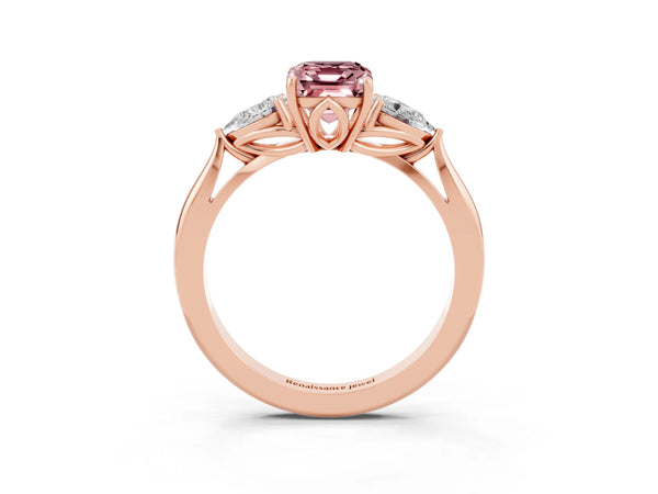 Rose gold Three-Stone Emerald Cut Cut Diamond Ring with Pear Side Stones in Four-Prong Setting