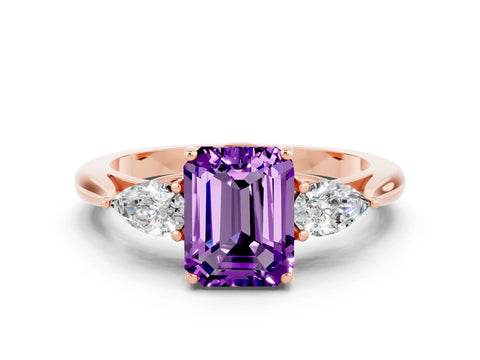 Rose gold Three-Stone Emerald Cut Cut Diamond Ring with Pear Side Stones in Four-Prong Setting