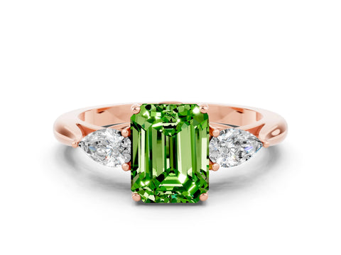 Rose gold Three-Stone Emerald Cut Cut Diamond Ring with Pear Side Stones in Four-Prong Setting