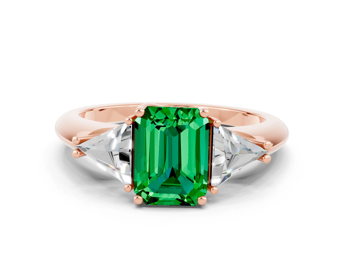 Rose gold Three-Stone Emerald Cut Cut Diamond Ring with Trillion Side Stones and Four-Prong Setting
