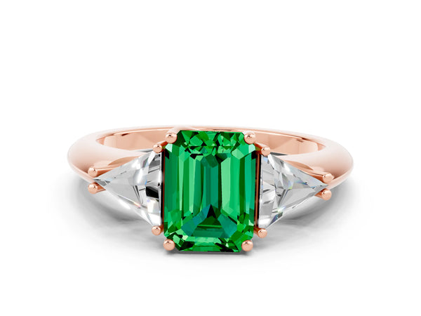 Rose gold Three-Stone Emerald Cut Emerald Engagement Ring with Trillion Side Stones and Prong Setting