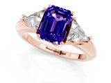 Rose gold Three-Stone Emerald Cut Cut Diamond Ring with Trillion Side Stones and Four-Prong Setting_1