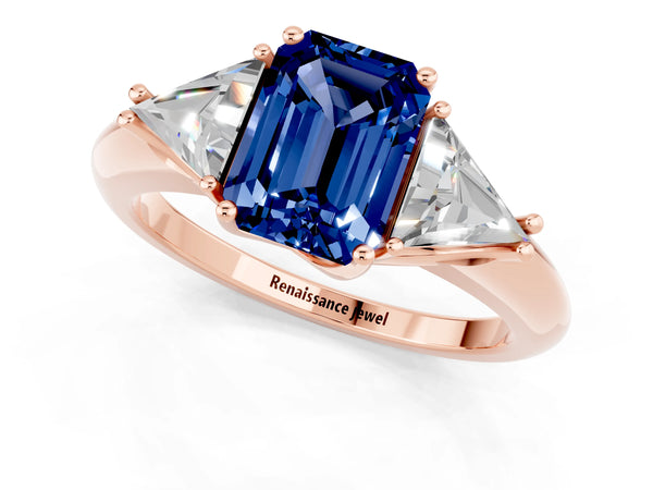 Rose gold Three-Stone Emerald Cut Blue Sapphire Engagement Ring with Trillion Side Stones and Prong Setting