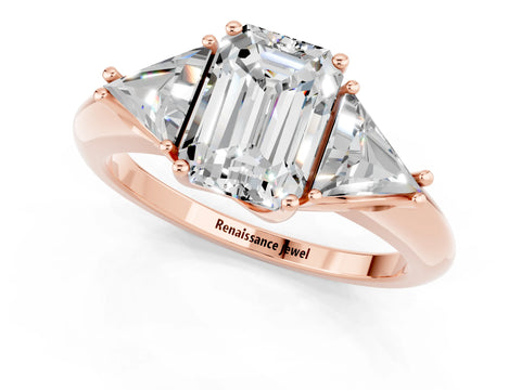 Rose gold Three-Stone Emerald Cut Cut Diamond Ring with Trillion Side Stones and Four-Prong Setting_1