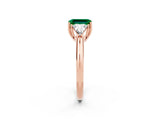 Rose gold Three-Stone Emerald Cut Cut Diamond Ring with Trillion Side Stones and Four-Prong Setting_2