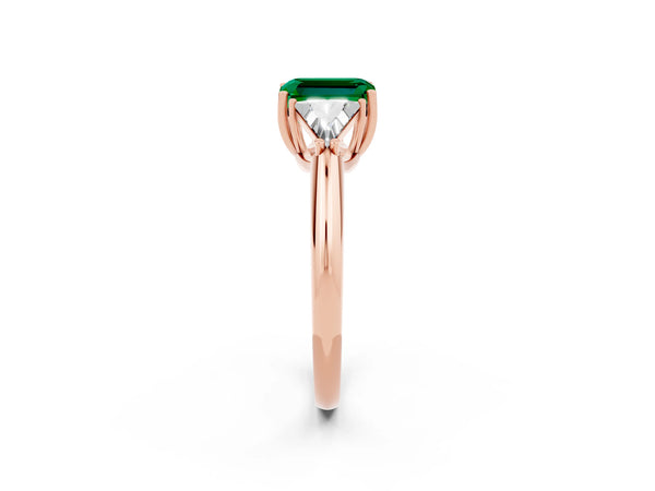 Rose gold Three-Stone Emerald Cut Emerald Engagement Ring with Trillion Side Stones and Prong Setting