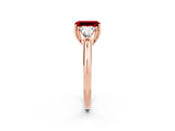 Rose gold Three-Stone Emerald Cut Cut Diamond Ring with Trillion Side Stones and Four-Prong Setting_2