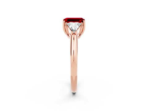 Rose gold Three-Stone Emerald Cut Cut Diamond Ring with Trillion Side Stones and Four-Prong Setting_2