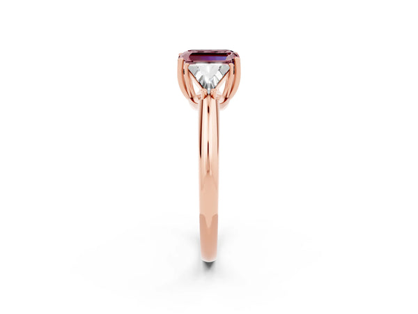 Rose gold Three-Stone Emerald Cut Cut Diamond Ring with Trillion Side Stones and Four-Prong Setting