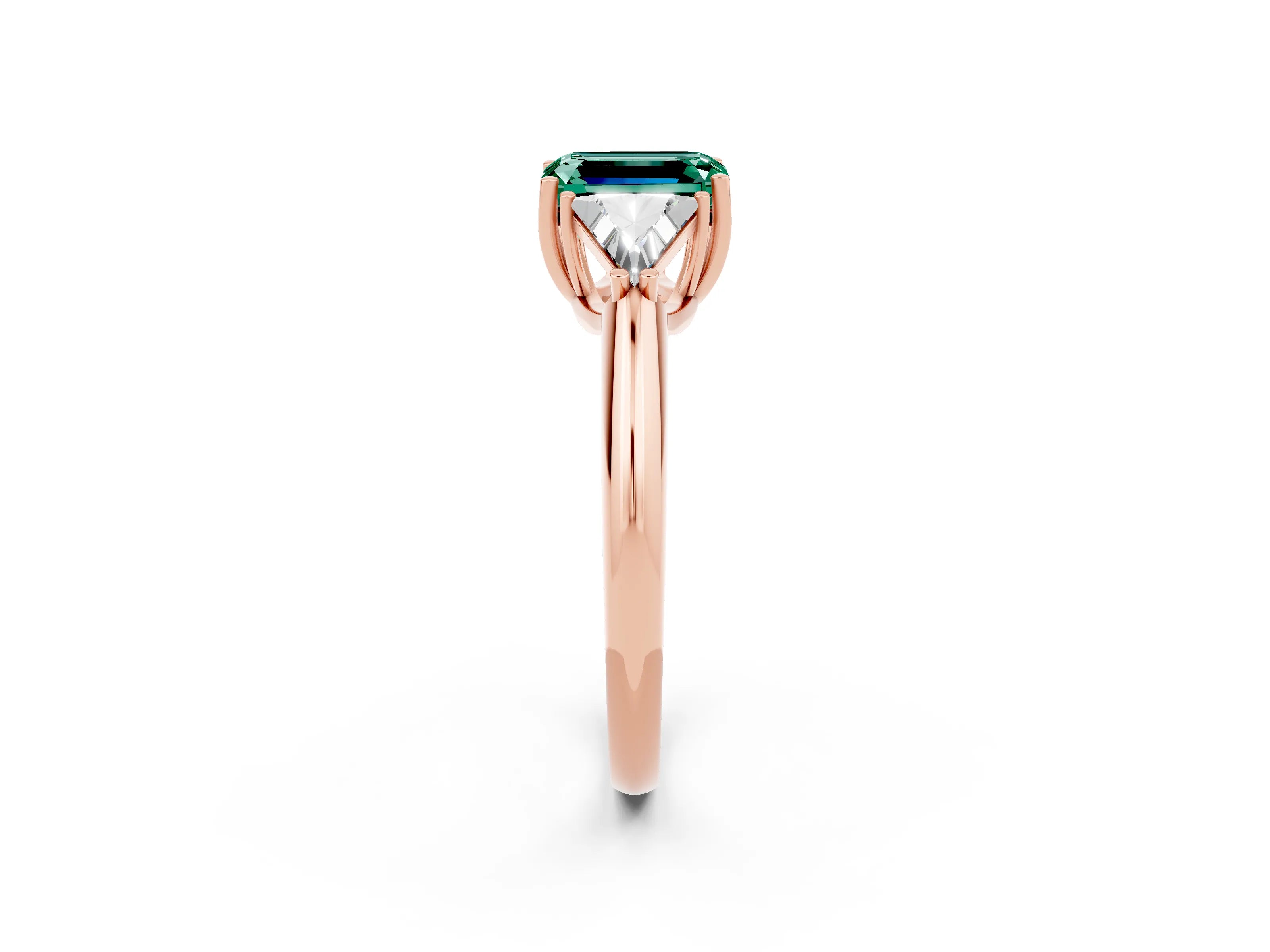 Rose gold Three-Stone Emerald Cut Cut Diamond Ring with Trillion Side Stones and Four-Prong Setting_2