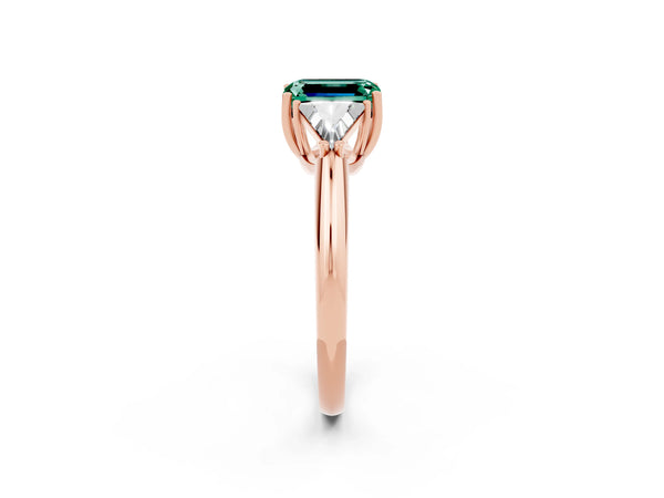 Rose gold Three-Stone Emerald Cut Green Sapphire Engagement Ring with Trillion Side Stones and Prong Setting