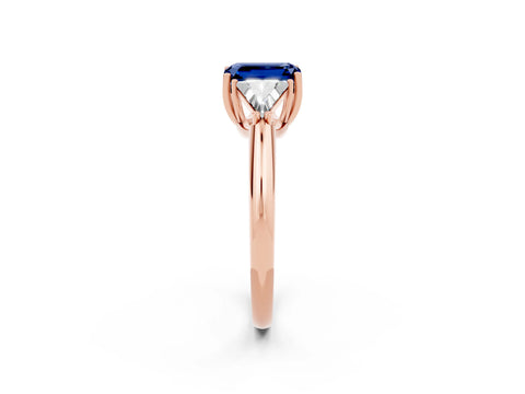 Rose gold Three-Stone Emerald Cut Cut Diamond Ring with Trillion Side Stones and Four-Prong Setting_2