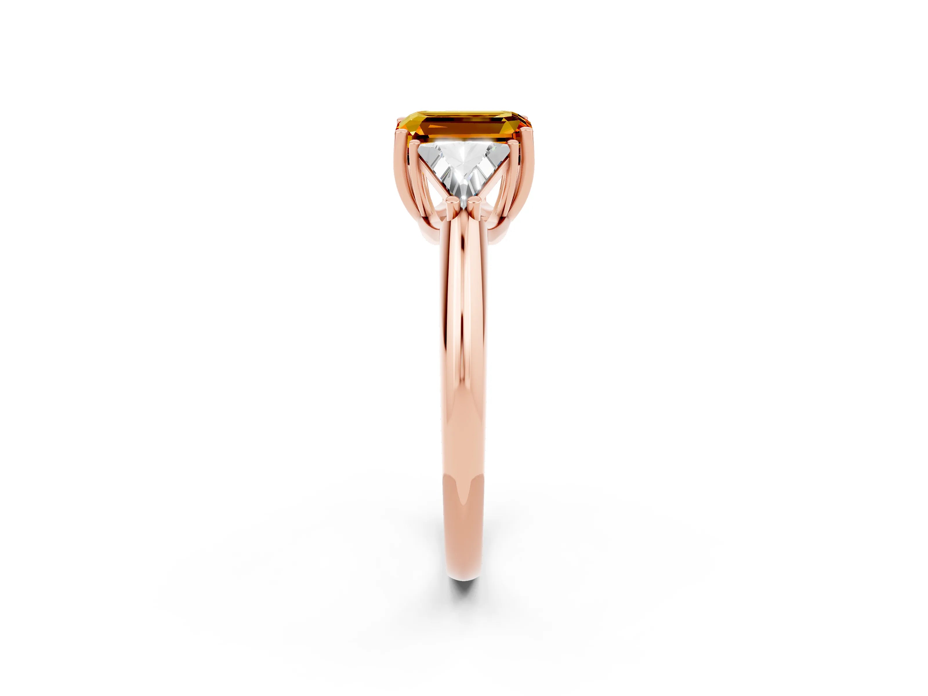 Rose gold Three-Stone Emerald Cut Cut Diamond Ring with Trillion Side Stones and Four-Prong Setting_2