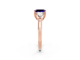 Rose gold Three-Stone Emerald Cut Cut Diamond Ring with Trillion Side Stones and Four-Prong Setting_2