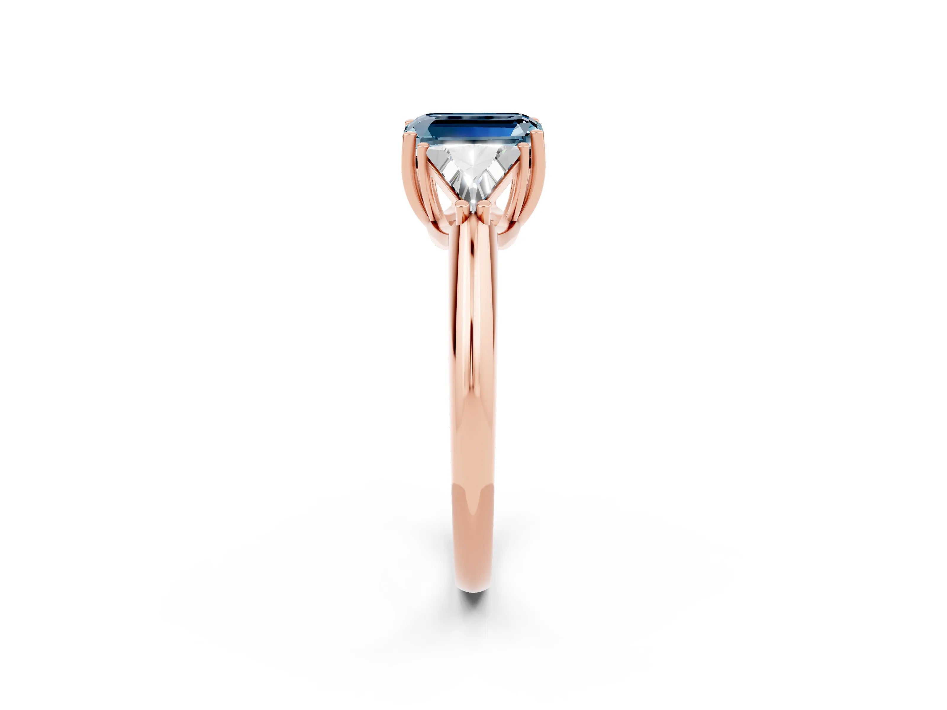 Rose gold Three-Stone Emerald Cut Cut Diamond Ring with Trillion Side Stones and Four-Prong Setting_2