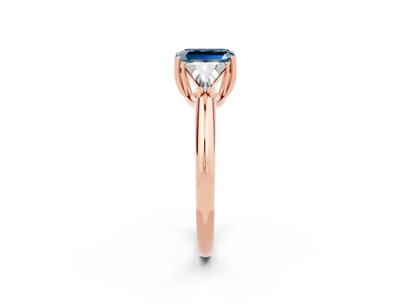 Rose gold Three-Stone Emerald Cut Aquamarine Engagement Ring with Trillion Side Stones and Prong Setting