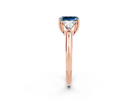 Rose gold Three-Stone Emerald Cut Cut Diamond Ring with Trillion Side Stones and Four-Prong Setting_2