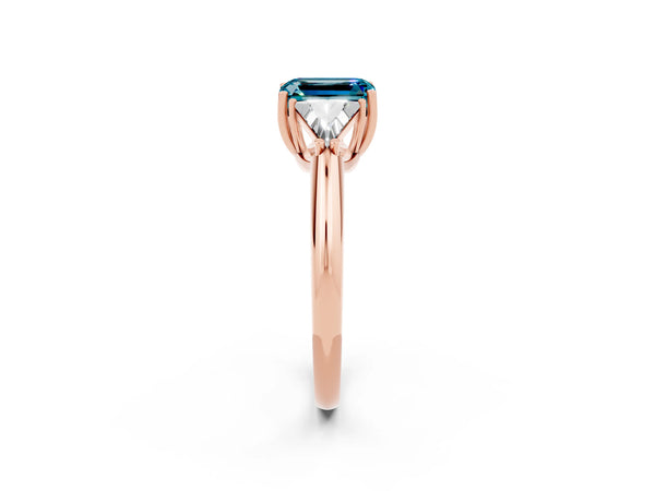 Rose gold Three-Stone Emerald Cut Cut Diamond Ring with Trillion Side Stones and Four-Prong Setting
