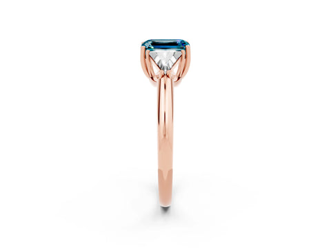 Rose gold Three-Stone Emerald Cut Cut Diamond Ring with Trillion Side Stones and Four-Prong Setting_2