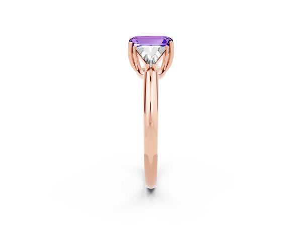 Rose gold Three-Stone Emerald Cut Tanzanite Engagement Ring with Trillion Side Stones and Prong Setting