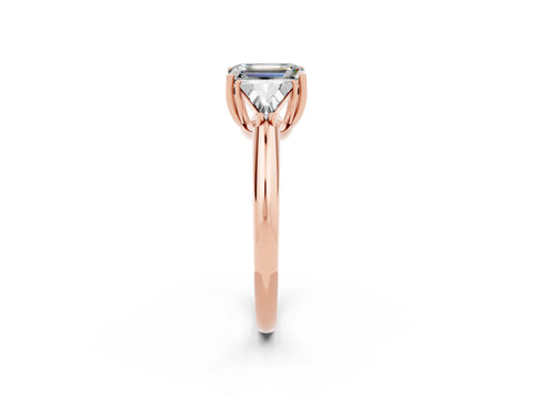 Rose gold Three-Stone Emerald Cut Cut Diamond Ring with Trillion Side Stones and Four-Prong Setting_2