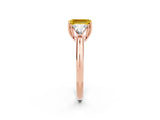 Rose gold Three-Stone Emerald Cut Cut Diamond Ring with Trillion Side Stones and Four-Prong Setting_2