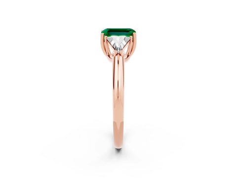 Rose gold Three-Stone Emerald Cut Cut Diamond Ring with Trillion Side Stones and Four-Prong Setting_2