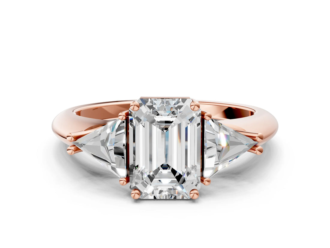 Rose gold Three-Stone Emerald Cut Cut Diamond Ring with Trillion Side Stones and Four-Prong Setting_3