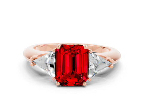 Rose gold Three-Stone Emerald Cut Cut Diamond Ring with Trillion Side Stones and Four-Prong Setting