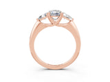 Rose gold Three-Stone Emerald Cut Cut Diamond Ring with Trillion Side Stones and Four-Prong Setting_3