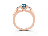 Rose gold Three-Stone Emerald Cut Cut Diamond Ring with Trillion Side Stones and Four-Prong Setting_3