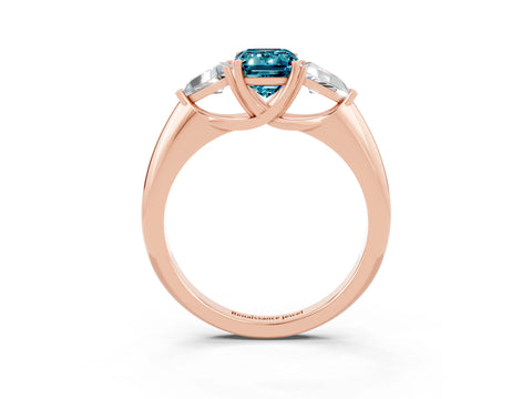 Rose gold Three-Stone Emerald Cut Cut Diamond Ring with Trillion Side Stones and Four-Prong Setting_3
