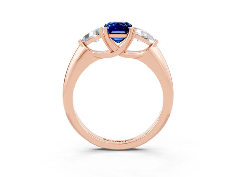 Rose gold Three-Stone Emerald Cut Cut Diamond Ring with Trillion Side Stones and Four-Prong Setting_3