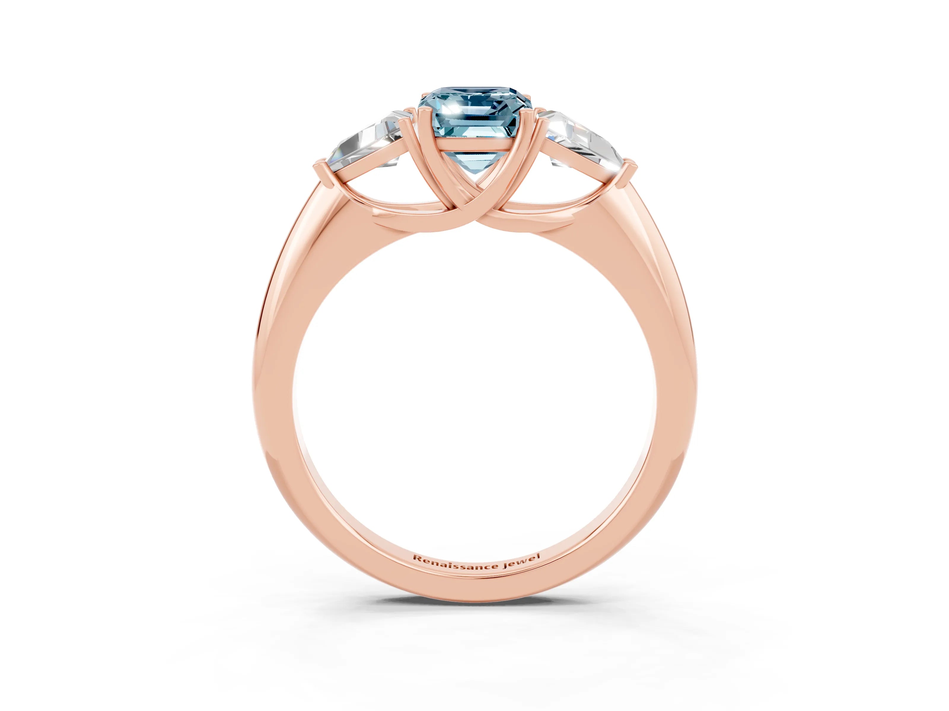 Rose gold Three-Stone Emerald Cut Cut Diamond Ring with Trillion Side Stones and Four-Prong Setting_3