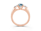 Rose gold Three-Stone Emerald Cut Cut Diamond Ring with Trillion Side Stones and Four-Prong Setting_3
